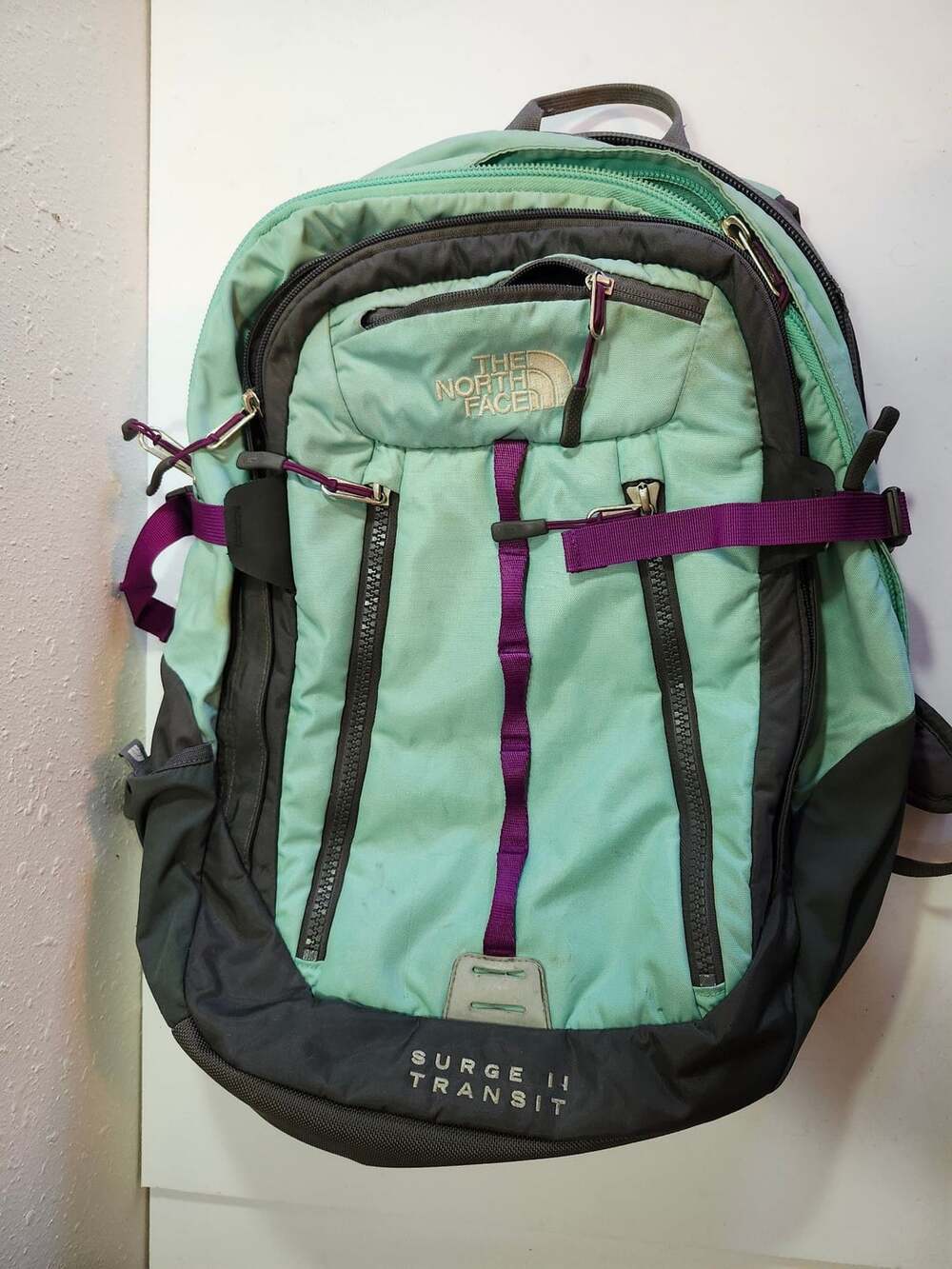 The North Face Surge II Transit Backpack Aqua Green and Gray